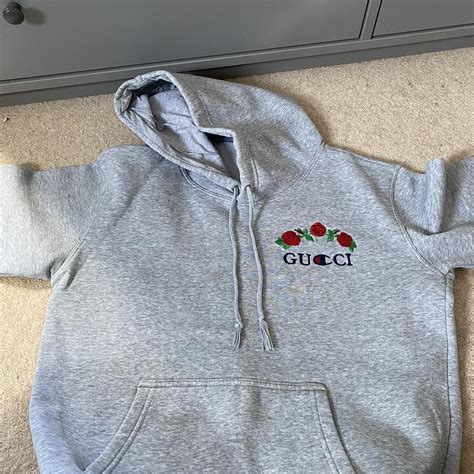 gucci x champion hoodie price.